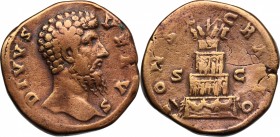 Divus Lucius Verus (died 169 AD). AE Sestertius, struck under Marcus Aurelius. D/ DIVVS VERVS. Bare head right. R/ CONSECRATIO SC. Funeral pyre, adorn...