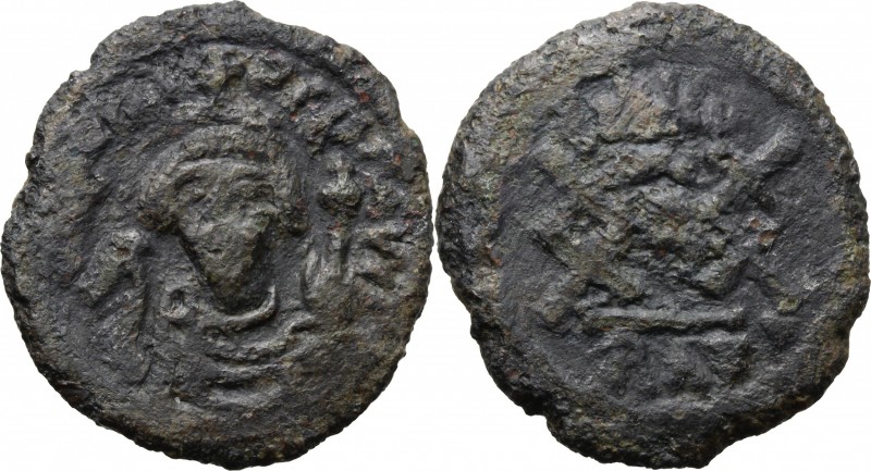 Phocas (602-610). AE Follis, Ravenna mint. D/ Crowned, draped and cuirassed bust...