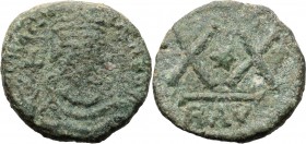 Phocas (602-610). AE Half Follis, Ravenna mint. D/ Crowned, draped and cuirasses bust facing, holding cross (or globus cruciger ?). R/ Large X X, with...