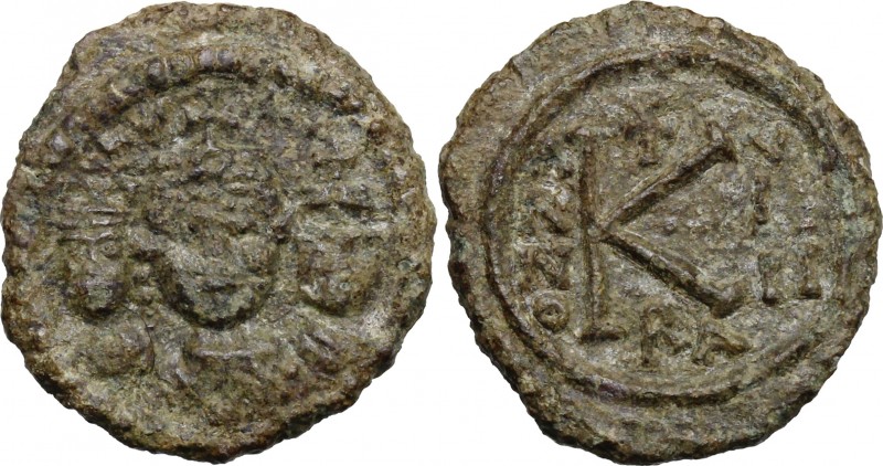 Heraclius (610-641). AE Half Follis, Ravenna mint, 618-619 AD. D/ Facing busts o...
