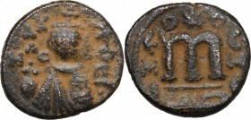 Umayyad Caliphate. Arab-Byzantine coinage (Pseudo-Byzantine type). AE Fals, circa 685-692. Hims (Emesa) mint. D/ Facing imperial bust, holding globus ...