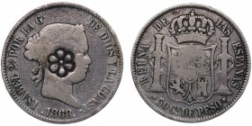 1868. Isabel II (1833-1868). Manila. 50 centavos de Peso. Ag. Resello flor. MBC-. Est.20.