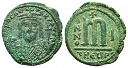 Phocas (602-610 AD). AE 

Condition: Very Fine
Weight: 11.10 gr
Diameter: 28 mm