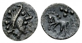 Vindelici AR fraction, 150-50 BC 

Celtic Germany, Vindelici. AR fraction ("Kleinsilber") (8-9 mm, 0.45 g), 150-50 BC. "Stachelhaar b" Type.
Obv. C...