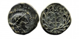 LYDIA. Sardes. Circa 133 BC-AD 14. AE 
Laureate head of Apollo to right. 
Rev. ΣAPΔIA-NΩN Club; all within wreath with monogram atop. 
BMC 18. SNG Cop...