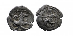 Lycaonia. Laranda 324-323 BC. Obol.AR
Baaltars seated left, holding grain ear, grape bunch, and sceptre
Rev: Forepart of wolf right; inverted cresce...