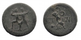 Pisidia, Etenna. 1st century B.C. AE 
Two men standing side by side; the left brandishing double-axe, the right sickle
Nymph advancing right; in front...