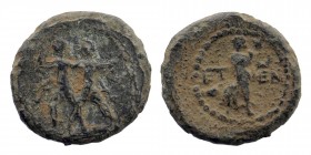 Pisidia, Etenna. 1st century B.C. AE 
Two men standing side by side; the left brandishing double-axe, the right sickle
Nymph advancing right.
SNG Fran...