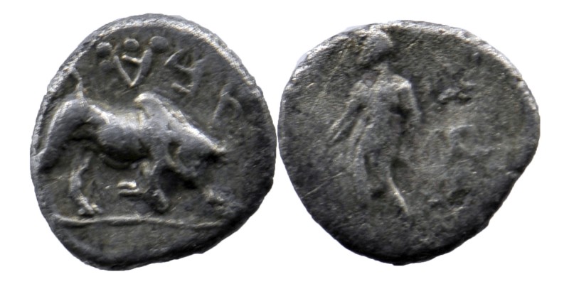 Cilicia. Uncertain mint circa 400-200 BC. Obol AR
Bull butting right / Male figu...