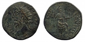 PISIDIA. Antiochia. Septimius Severus (193-211). Ae.
Laureate head left.
Rev; Mên standing left, with left foot on bucranium, holding scepter and Nike...