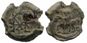 Byzantine Seal/Bulla c. 7th-12th century 
St. George on horseback left . Cruciform monogram
6,53 gr. 19 mm