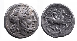 Kings of Macedonia, in the name of Philip II 359-336 BC, posthumous issue, Amphipolis Mint, ca. 323-315 BC.
Laureate head of Zeus right;
Nude youth on...