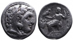 Kings of Macedonia, Philip III Arrhidaeus, 323-317 BC, Colophon Mint, ca. 323-319 BC.
Head of Herakles wearing lion's scalp right
Zeus seated left, ho...