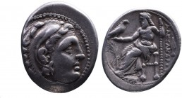 Kings of Macedonia, Alexander III the Great, 336-323 BC, posthumous issue struck under Philip III, Teos Mint, ca. 323-319 BC.
Head of Herakles wearing...