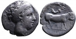 Campania, Neapolis, ca. 350-325 BC.
Head of nymph wearing broad headband and earrings right;
Man-faced bull standing right, head facing, above Nike fl...