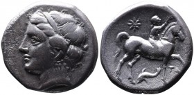 Calabria, Tarentum, Campano-Tarentine coinage, ca. 281-272 BC.
Diademed head of nymph Satyra left 
Youth on the horse walking right, crowning horse's ...