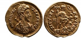 Honorius AD 395-423 AD, Mediolanum Mint, ca. AD 395-402.
Pearl-diademed, draped and cuirassed bust of Honorius right, DN HONORIVS PF AVG;
Emperor stan...