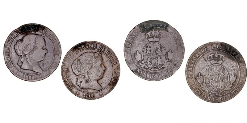 MONARQUÍA ESPAÑOLA
ISABEL II
5 Céntimos de Escudo. Lote de 2 monedas. AE. 1868...