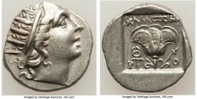 CARIAN ISLANDS. Rhodes. Ca. 88-84 BC. AR drachm (16mm, 2.59 gm, 12h). XF. Plinthophoric standard, Callixein(os), magistrate. Radiate head of Helios ri...