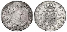 Carlos III (1759-1788). 2 reales. 1785. Madrid. DV. (Cal 2019-636). Ag. 6,02 g. Leves rayitas. Parte de brillo original. Muy escasa en esta coservació...