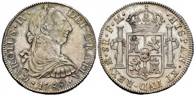 Carlos IV (1788-1808). 8 reales. 1789. México. FM. (Cal 2019-950). Ag. 26,95 g. Busto de Carlos III y ordinal IV. Rayitas. Pleno brillo original en re...