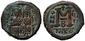BIZANTINE - Giustino II (565-578) - Follis - Giustino e Sofia seduti di fronte /R Lettera M sormontata da croce Ratto 782/824; Sear 360 (AE g. 13,61)...
