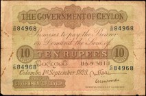 CEYLON. Government of Ceylon. 10 Rupees, 1928. P-24a. Fine.

A scarce large format 10 Rupees note, found with a date of September 1st, 1928. In Fine...