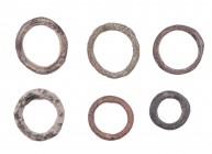 Lote de 6 pre-monedas celtas en forma de anillo. A examinar. MBC.