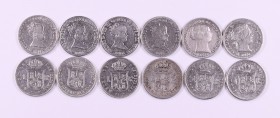 Isabel II. Barcelona, Madrid y Sevilla. 1 real. Lote de 12 monedas, diez distintas. BC/MBC.