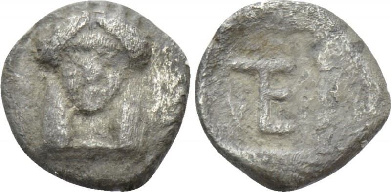 IONIA. Kolophon. Tetartemorion (Circa 450-410 BC). 

Obv: Facing head of Apoll...