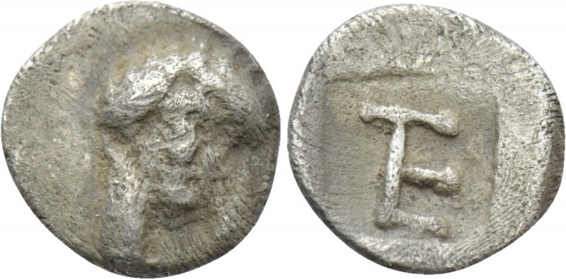 IONIA. Kolophon. Tetartemorion (Circa 450-410 BC). 

Obv: Facing head of Apoll...