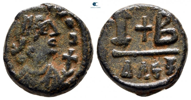 Tiberius II Constantine AD 578-582. Alexandria
12 Nummi Æ

15 mm., 3,86 g.
...