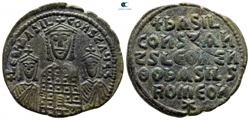 Basil I, with Leo VI and Constantine VII AD 867-886. Constantinople
Follis Æ
...