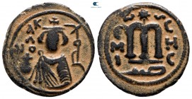 Time of 'Abd al-Malik ibn Marwan AD 685-705. (AH 65-86). Imperial bust type (Type VII). Struck circa AD 685-690s. Hims (Emesa) . Fals Æ