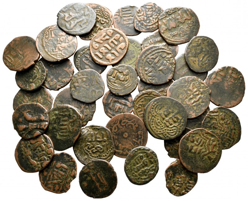 Lot of ca. 40 islamic bronze coins / SOLD AS SEEN, NO RETURN!

very fine