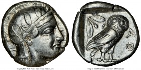ATTICA. Athens. Ca. 455-440 BC. AR tetradrachm (24mm, 17.13 gm, 10h). NGC XF 4/5 - 4/5. Early transitional issue. Head of Athena right, wearing creste...