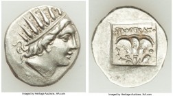 CARIAN ISLANDS. Rhodes. Ca. 88-84 BC. AR drachm (16mm, 2.63 gm, 12h). About XF. Plinthophoric standard, Philostratus, magistrate. Radiate head of Heli...