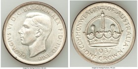 George VI Pair of Uncertified Crowns 1937, 1) Crown - AU. 38mm. 28.31gm. 2) Crown - UNC. 38mm. 28.2gm. Melbourne mint, KM34. Sold with old dealer tags...