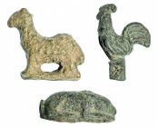 HISPANIA ANTIGUA. Cultura Ibérica. Bronce. Lote de tres figuras exentas: carnero, gallo y liebre. Altura: 2,8; 1,5 y 3,2 cm. Siglos IV-II a.C.