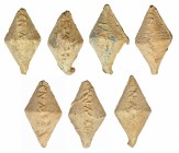 ROMA. Repúbica Romana. Plomo. Lote de siete glandes bicónicos con inscripción CN. MAG. Longitud: 4-5 cm. 46-45 a.C.
