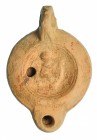 ROMA. Imperio Romano. Terracota. Lucerna con representación de Cupido. Altura: 10,1 cm. S. II d.C.