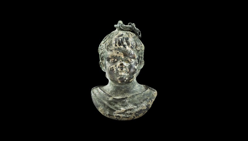 A Roman solid cast bronze weight depicting a young boy. 1st-3rd century AD. 8cm ...