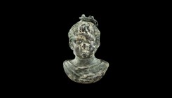 A Roman solid cast bronze weight depicting a young boy. 1st-3rd century AD. 8cm high. From an esteemed American collection; former German private coll...