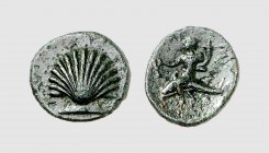 Calabria. Tarentum. 275-200 BC. Æ (1.87g, 9h). Laffaille 7; SNG ANS 1602. Attractive dark green patina. Unusually well-centered. Extremely fine. From ...