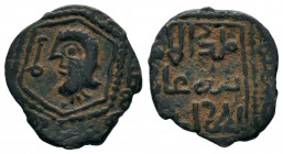 MANGUJAKIDS OF ERZINJAN FAKHR AD-DIN BAHRAMSHAH 568-622 H./1168-1225 AD. Fals 579 H., Erzinjan. Head of ruler with long hair turned to left in six sid...