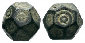 Byzantine bronze barrel weight with ring and dot motifs,About fine to about very fine.

Weight: 14,68 gr
Diameter: 14,65 mm
