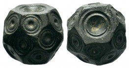 Byzantine bronze barrel weight with ring and dot motifs,About fine to about very fine.

Weight: 14,76 gr
Diameter: 14,90 mm