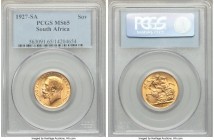George V gold Sovereign 1927-SA MS65 PCGS, Pretoria mint, KM21. Blooming golden luster and carefully preserved surfaces render this gem example a fair...