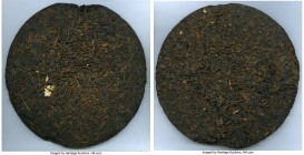 People's Republic Pu-erh Bingcha Tea Cake of 10.8 Ounces ND (c. 1950s-1970s) AU/UNC (Chipped), Opitz-pg. 339 (this piece illustrated). 87mm. 306.1gm. ...