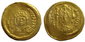 Solidus AV
Justinian I (527-565), Constantinople, D N IVSTINIANVS P P. Helmeted and cuirassed bust facing, holding globus cruciger and shield with ho...